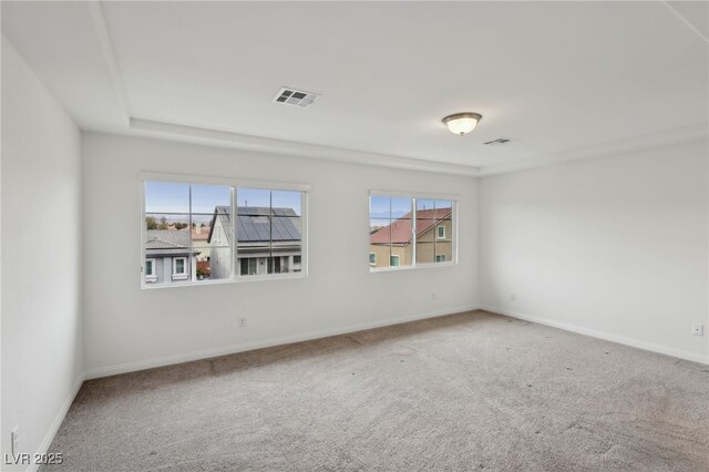 unfurnished room with carpet floors