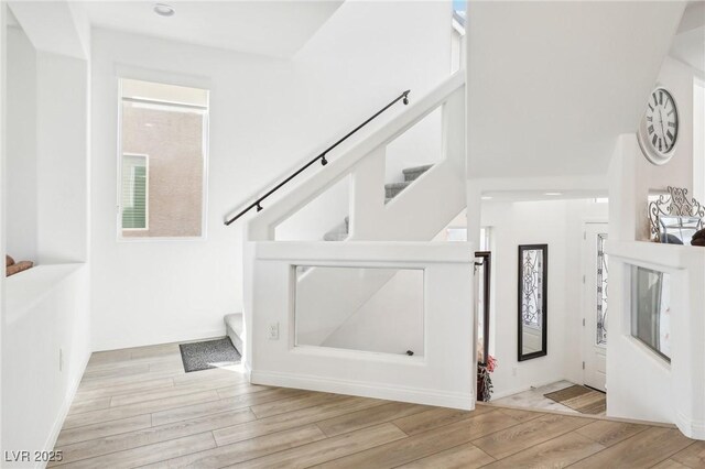 foyer with light hardwood / wood-style flooring