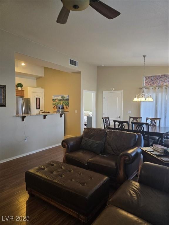 8985 S Durango Dr Unit 2062, Las Vegas, NV 89113 - living room featuring a ceiling fan, wood finished floors, baseboards, and visible vents