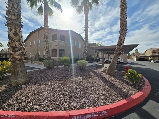 8985 S Durango Dr Unit 2062, Las Vegas, NV 89113 - view of property exterior featuring stucco siding