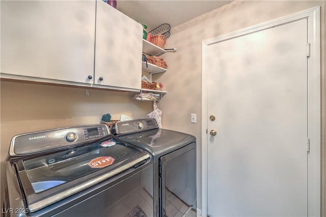 laundry area with cabinets and independent washer and dryer