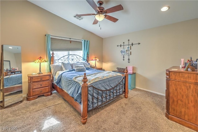 carpeted bedroom with vaulted ceiling and ceiling fan