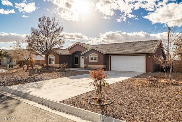 ranch-style home with a garage