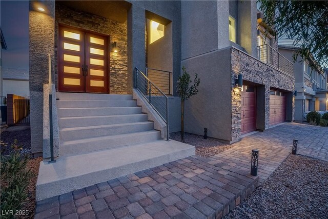 entrance to property featuring a garage