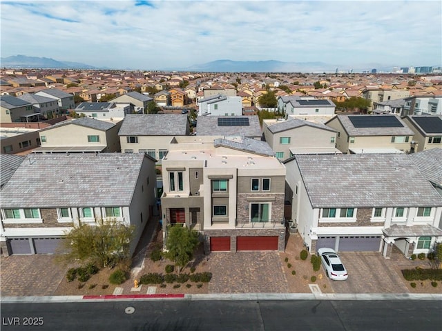 birds eye view of property featuring a mountain view