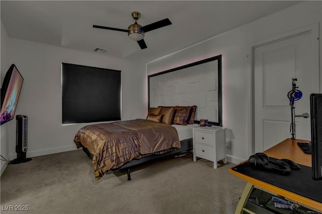 bedroom featuring light carpet and ceiling fan