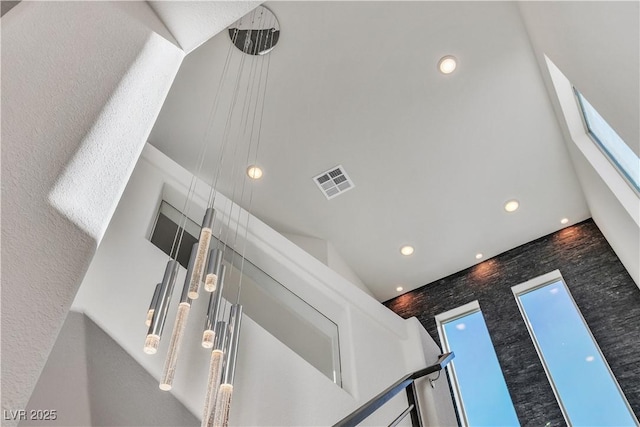 room details with visible vents and recessed lighting