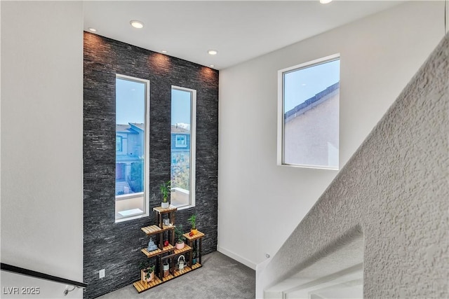 interior space with carpet flooring and recessed lighting