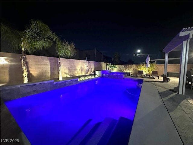 pool at twilight featuring a patio area, a fenced backyard, and a fenced in pool