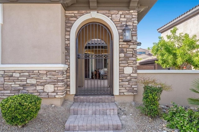 2920 Josephine Dr, Henderson, NV 89044 - doorway to property with stone siding and stucco siding
