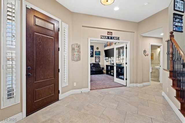 2920 Josephine Dr, Henderson, NV 89044 - entrance foyer with stairway and stone tile floors