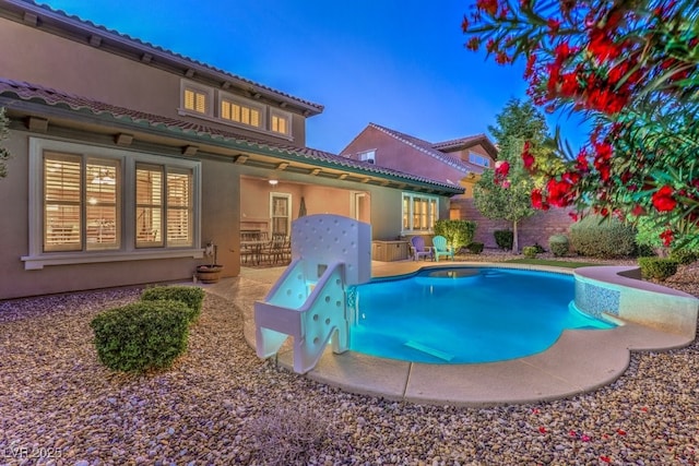 view of pool featuring a patio