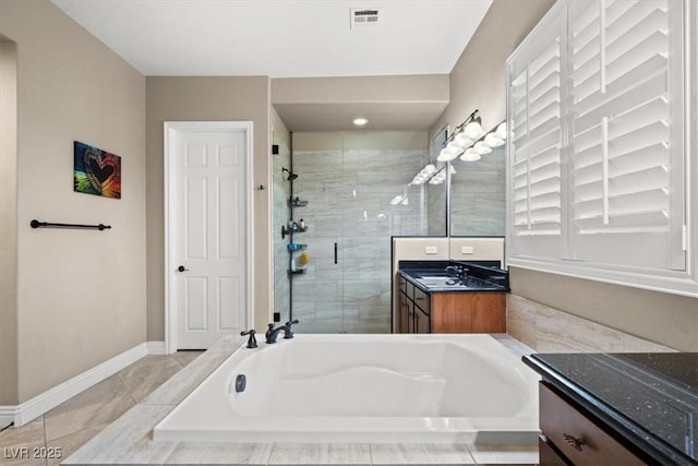 bathroom with vanity, separate shower and tub, and tile patterned floors