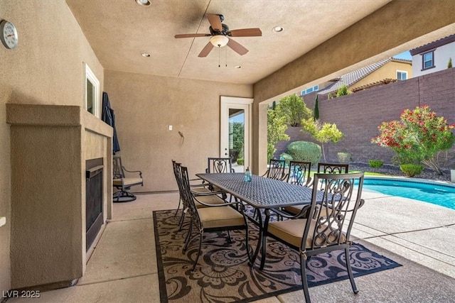 view of patio / terrace featuring ceiling fan