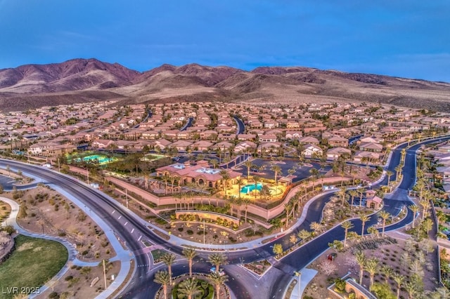 drone / aerial view featuring a mountain view