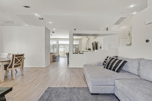 living room with light wood-type flooring