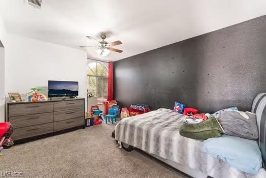 carpeted bedroom with ceiling fan