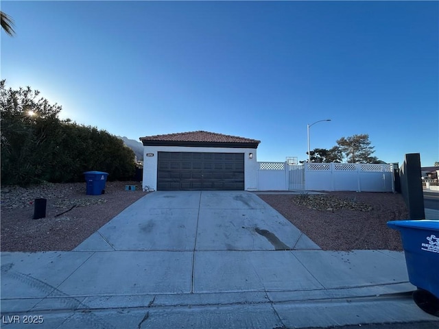 view of side of home featuring a garage