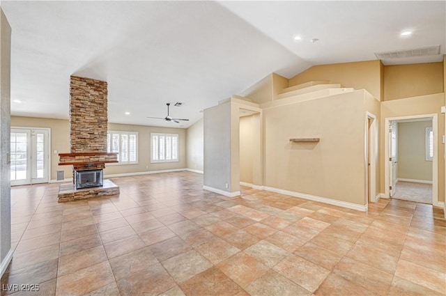 unfurnished living room featuring ceiling fan and vaulted ceiling