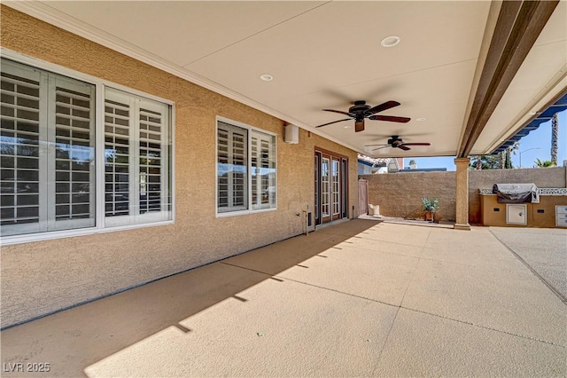 view of patio / terrace with area for grilling and ceiling fan