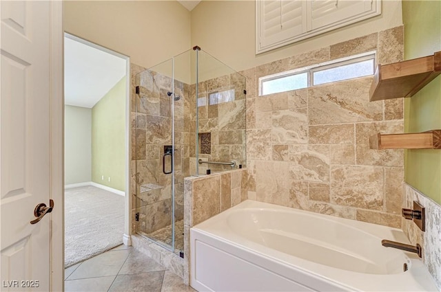 bathroom featuring tile patterned floors and plus walk in shower