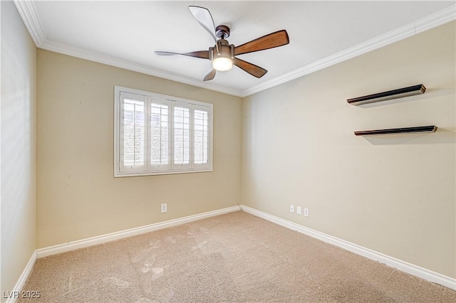 carpeted empty room with ornamental molding and ceiling fan