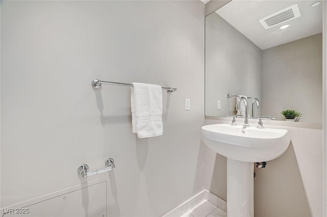 bathroom featuring sink and tile patterned floors