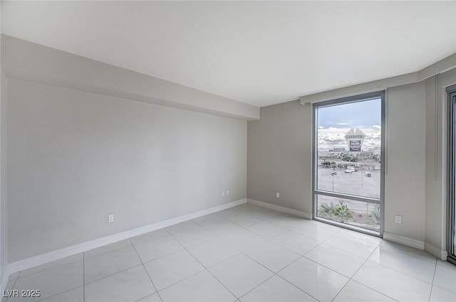 view of tiled spare room