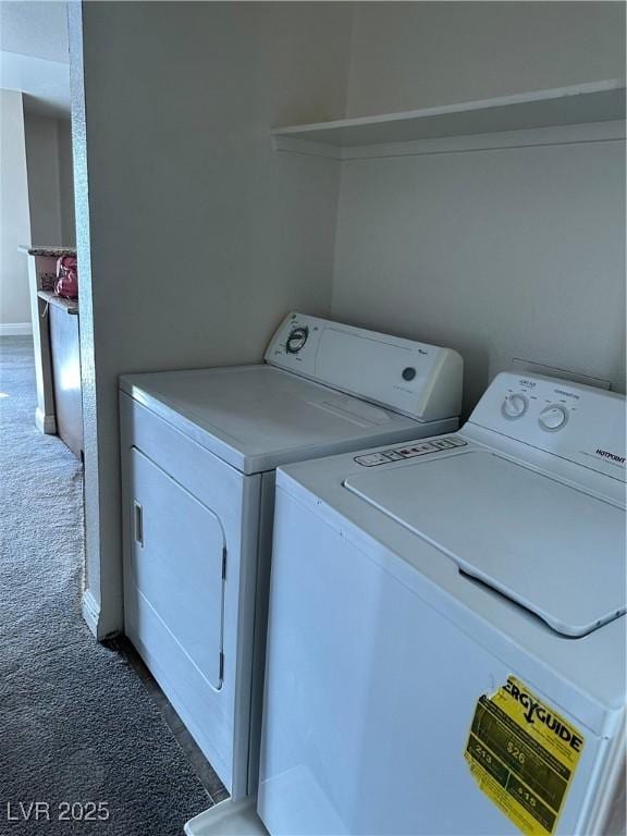 washroom featuring dark carpet and independent washer and dryer