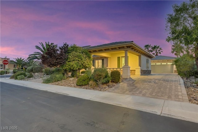 view of front of property with a garage