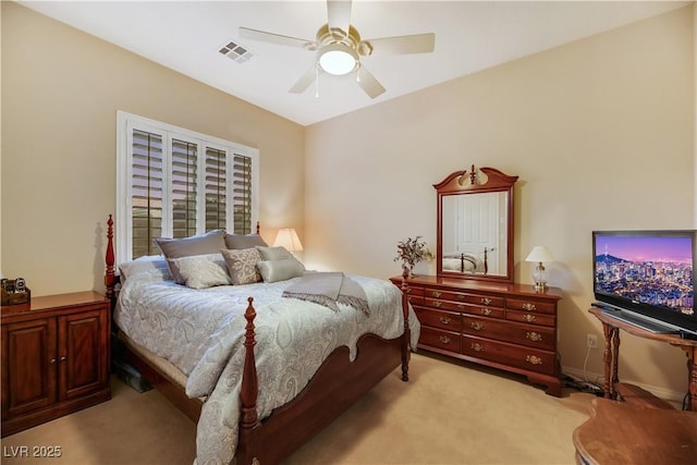 carpeted bedroom featuring ceiling fan