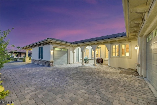 exterior space with a garage