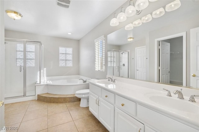 bathroom with vanity, shower with separate bathtub, and tile patterned flooring