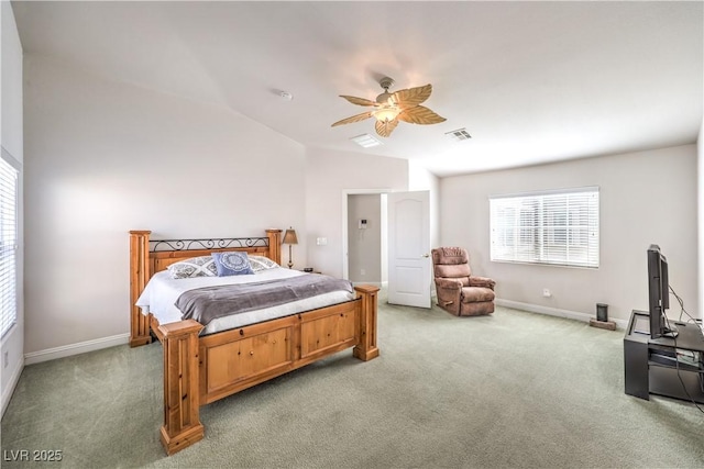 carpeted bedroom featuring ceiling fan and vaulted ceiling