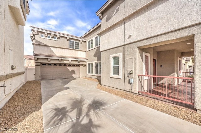 view of property exterior featuring a garage