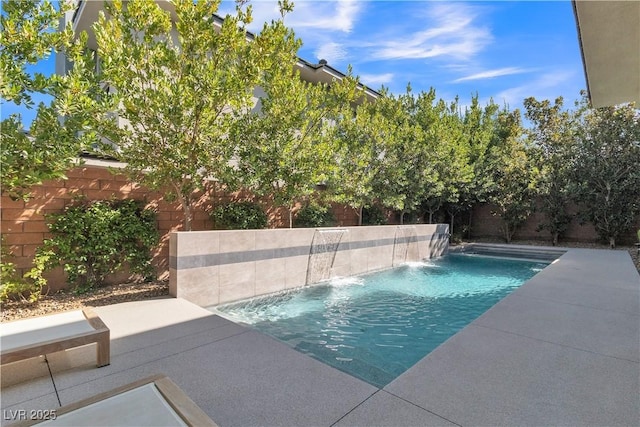 view of pool featuring a patio area and pool water feature