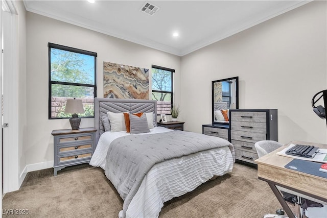 carpeted bedroom with ornamental molding