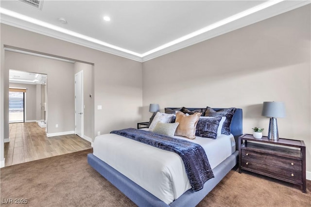 carpeted bedroom featuring ornamental molding