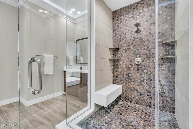 bathroom with a shower with shower door