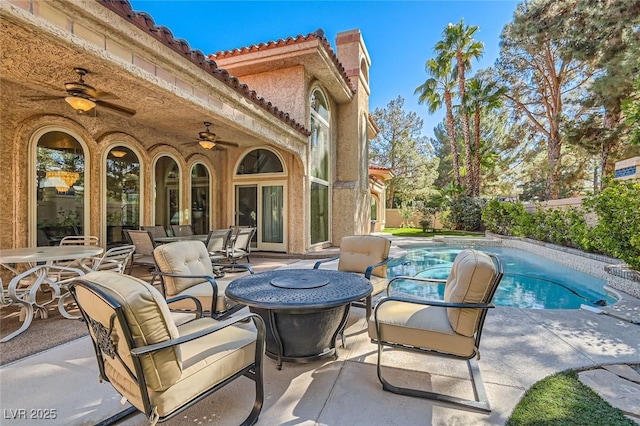 view of patio with ceiling fan