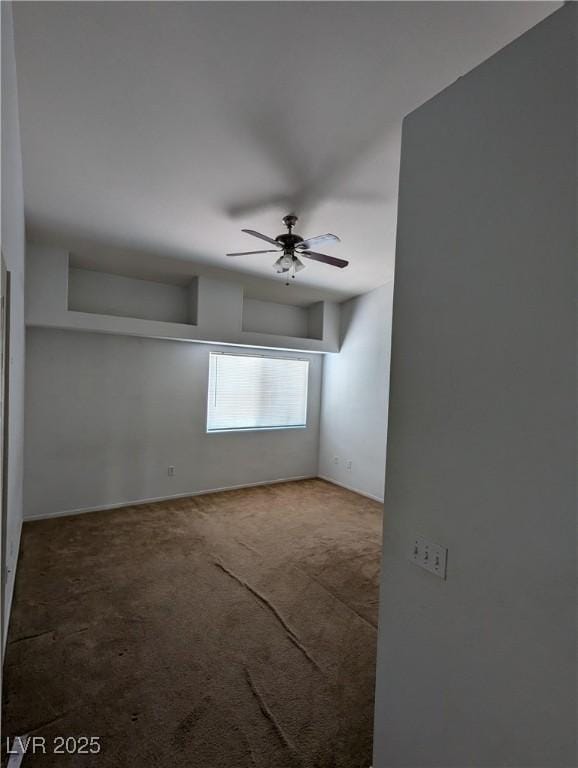 10524 Pine Gardens Ct Unit 203, Las Vegas, NV 89144 - unfurnished room with carpet floors and a ceiling fan