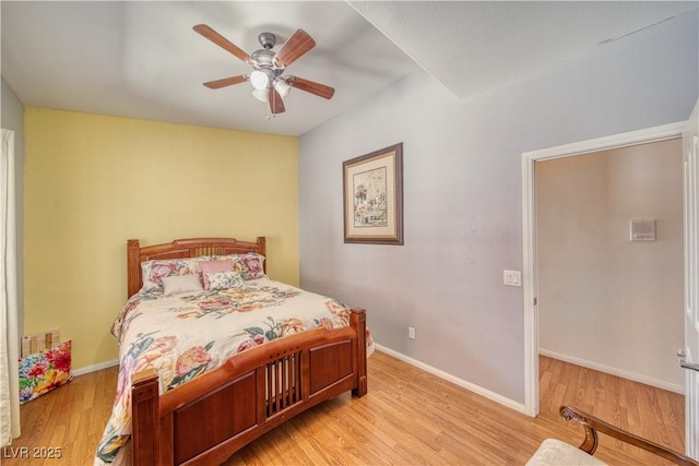 bedroom featuring ceiling fan and light wood-type flooring