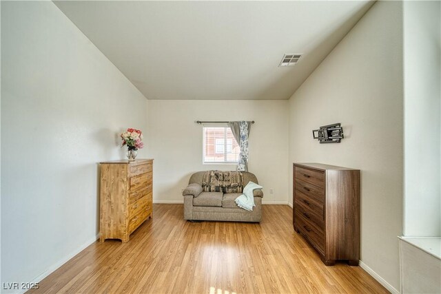 sitting room with light wood-type flooring