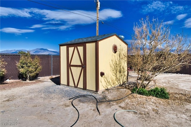 view of outdoor structure with a mountain view