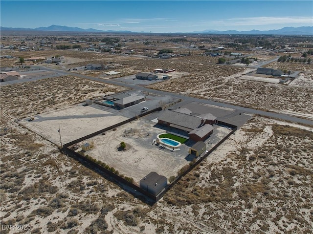 drone / aerial view featuring a mountain view