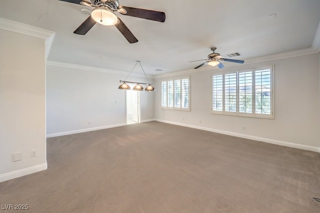 unfurnished room with crown molding, ceiling fan, and dark colored carpet