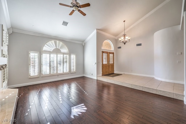 foyer featuring ornamental molding, ceiling fan with notable chandelier, hardwood / wood-style floors, and high vaulted ceiling