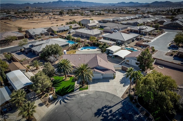 bird's eye view with a mountain view