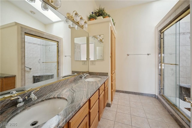 bathroom featuring walk in shower, tile patterned floors, and vanity