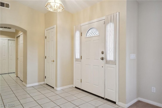 foyer entrance featuring light tile patterned floors